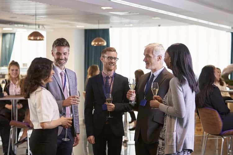 Working professionals at a networking event.